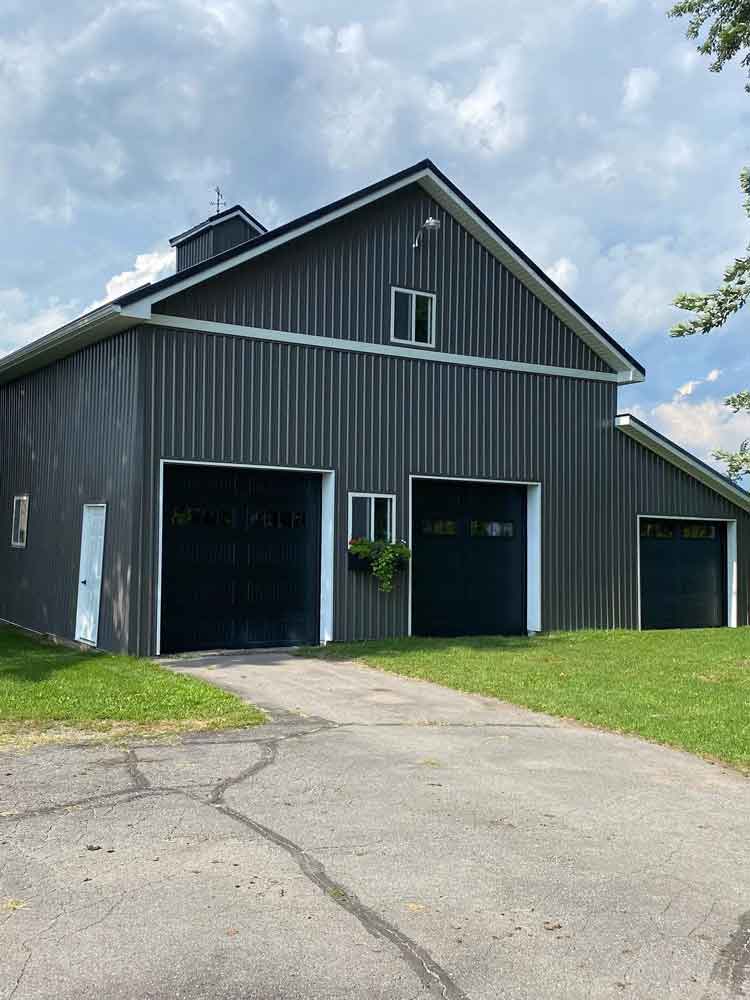 Barn after reface. New siding, doors,