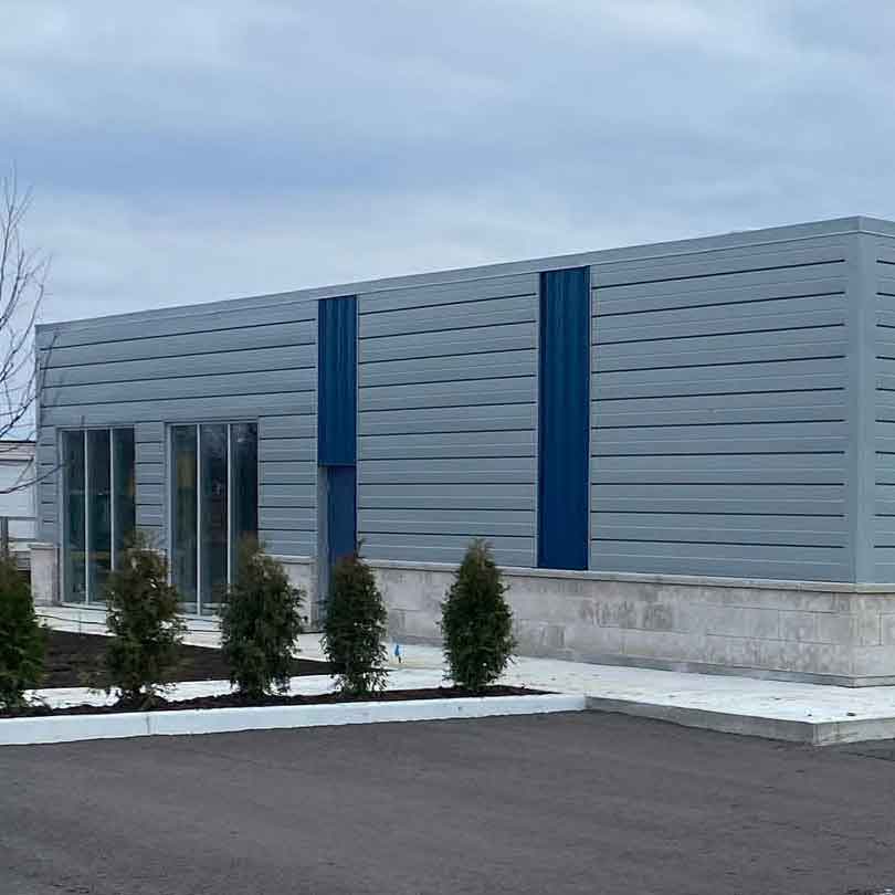 Steel siding application on commercial building in Kingston